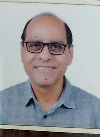 Shri Dilip Bhatia